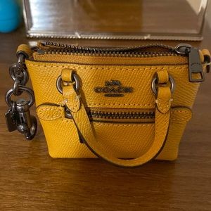 Coach mini tote keychain. Mustard yellow like new